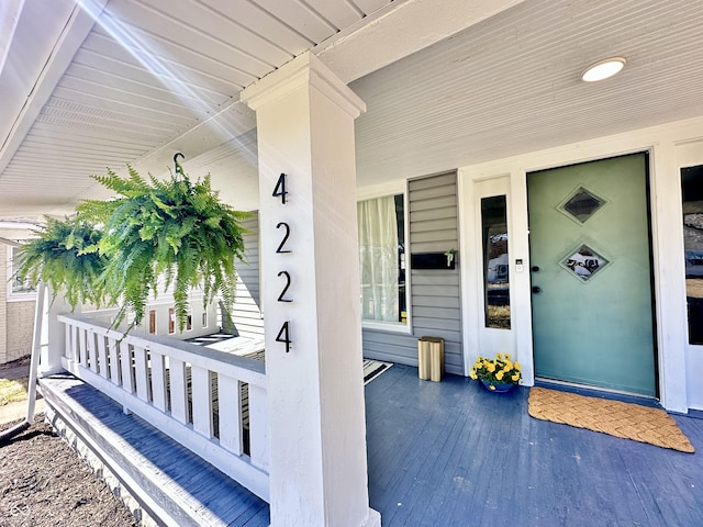 doorway to property featuring a porch