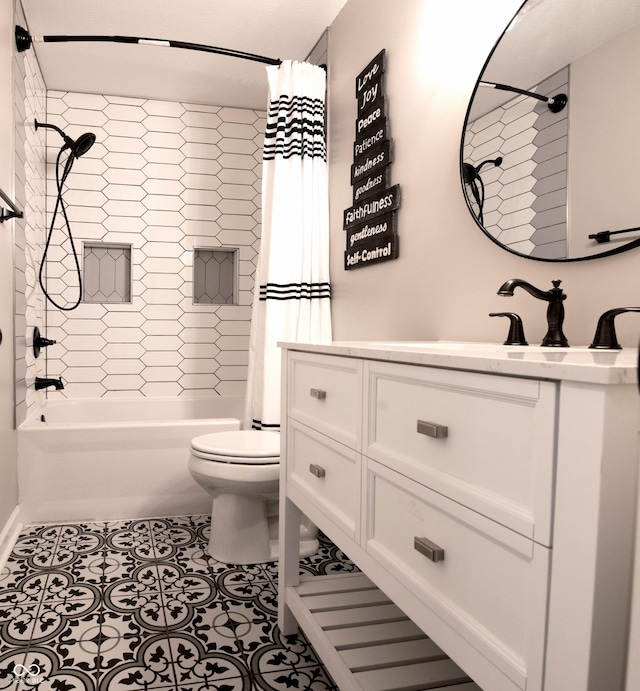 full bath with toilet, tile patterned flooring, shower / bath combo with shower curtain, and vanity