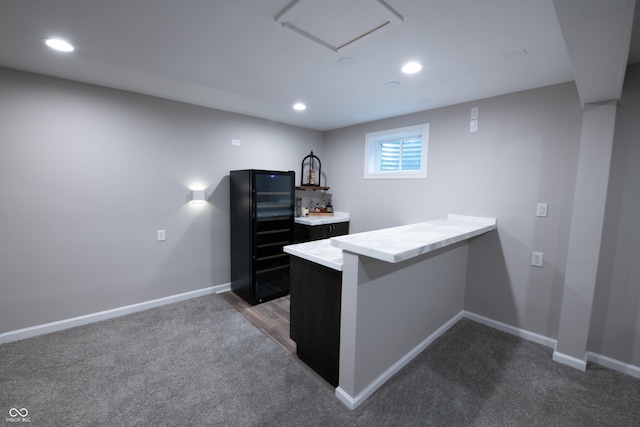 carpeted office space with baseboards and recessed lighting