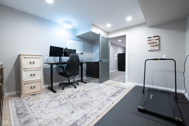 office featuring recessed lighting and baseboards