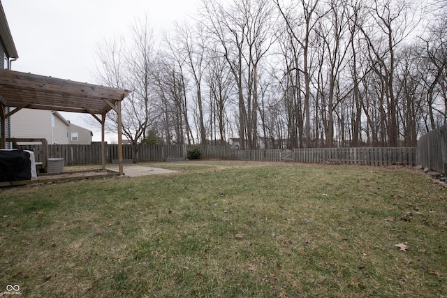 view of yard with a patio area and a fenced backyard