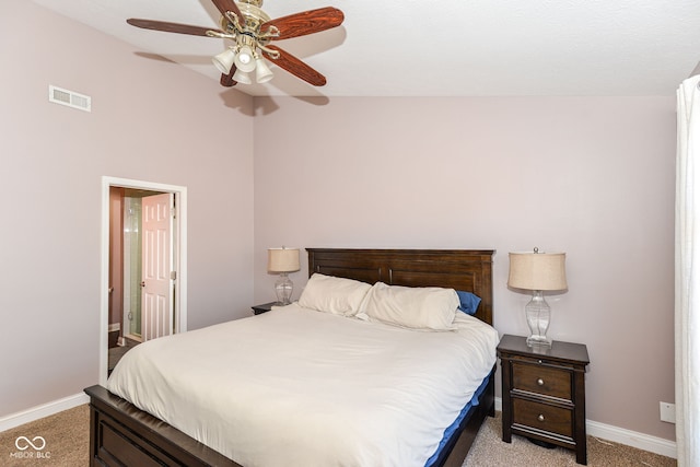 bedroom featuring light colored carpet, visible vents, and baseboards