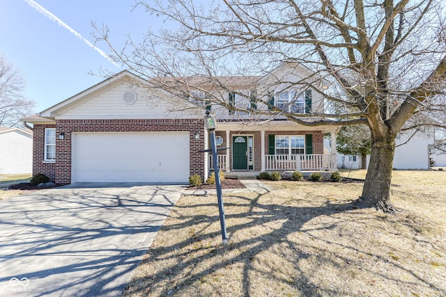 view of front of home featuring a garage, covered porch, brick siding, and driveway