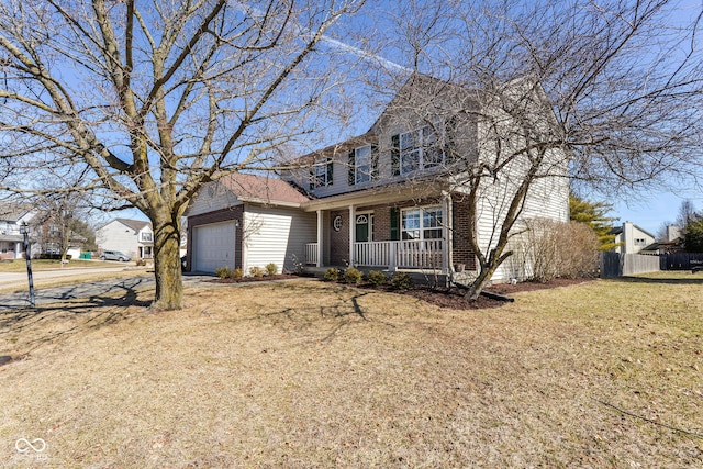 view of front of property with brick siding, a porch, an attached garage, fence, and driveway