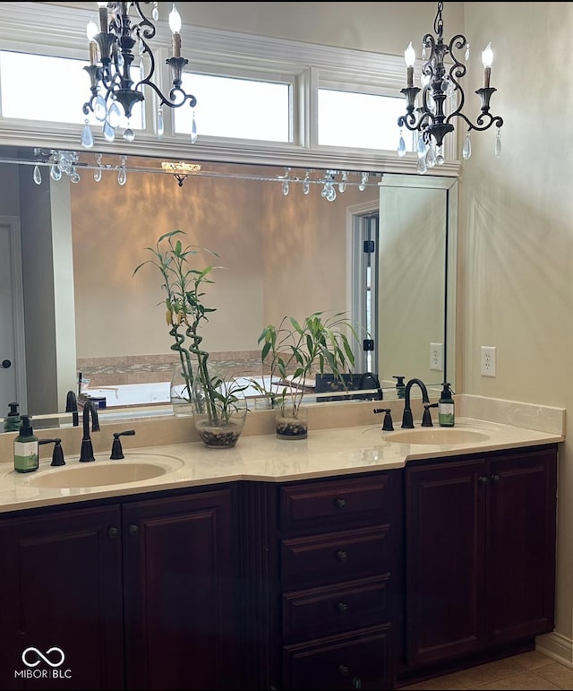 bathroom featuring double vanity, a sink, and an inviting chandelier