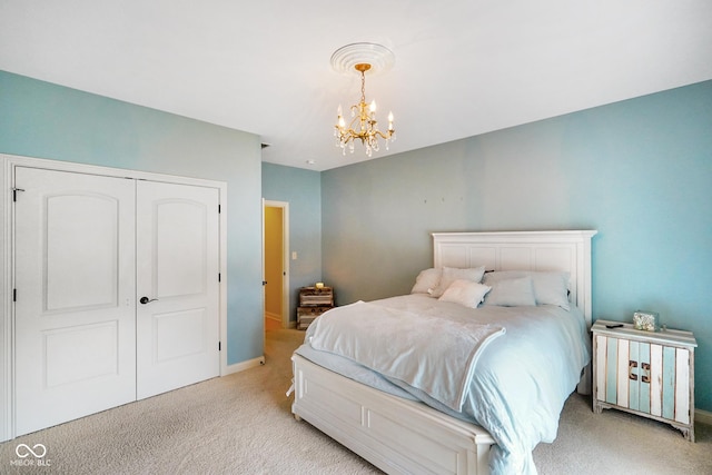 286 S Woodridge Dr, Pittsboro, IN 46167 - bedroom with light carpet, a chandelier, a closet, and baseboards