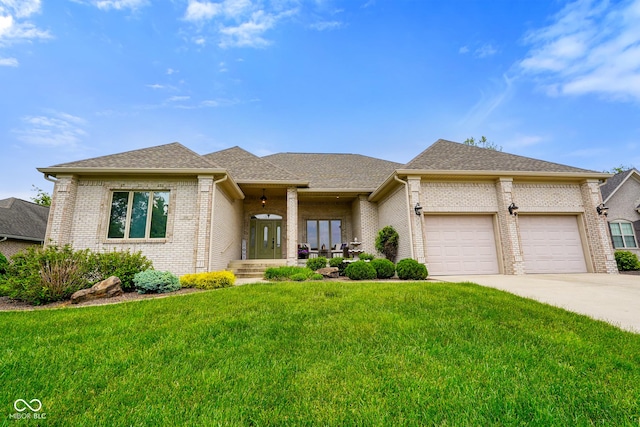 286 S Woodridge Dr, Pittsboro, IN 46167 - view of front facade with brick siding, an attached garage, driveway, a front lawn, and roof with shingles