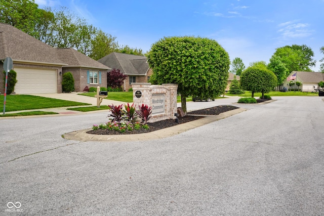 286 S Woodridge Dr, Pittsboro, IN 46167 - community / neighborhood sign featuring concrete driveway and an attached garage