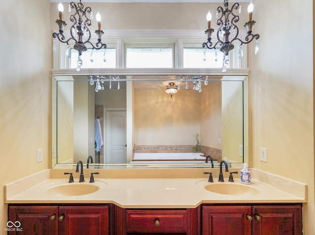 286 S Woodridge Dr, Pittsboro, IN 46167 - full bath featuring a chandelier and double vanity