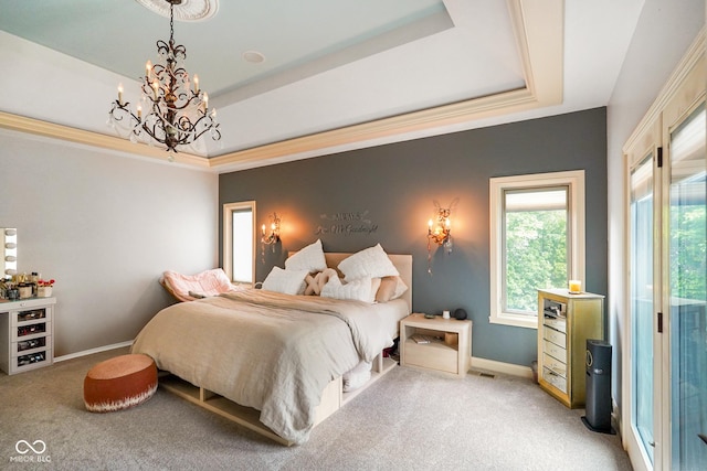 286 S Woodridge Dr, Pittsboro, IN 46167 - bedroom with carpet flooring, a raised ceiling, a chandelier, and baseboards