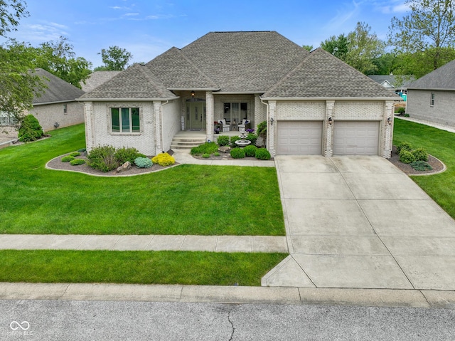 286 S Woodridge Dr, Pittsboro, IN 46167 - french provincial home with brick siding, a front yard, an attached garage, and roof with shingles