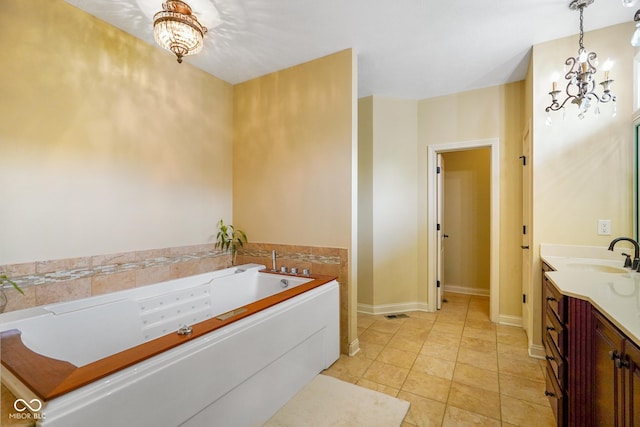 286 S Woodridge Dr, Pittsboro, IN 46167 - full bathroom with a chandelier, a tub with jets, vanity, and tile patterned flooring