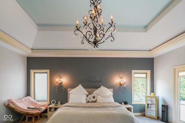286 S Woodridge Dr, Pittsboro, IN 46167 - carpeted bedroom with a raised ceiling, a chandelier, and crown molding