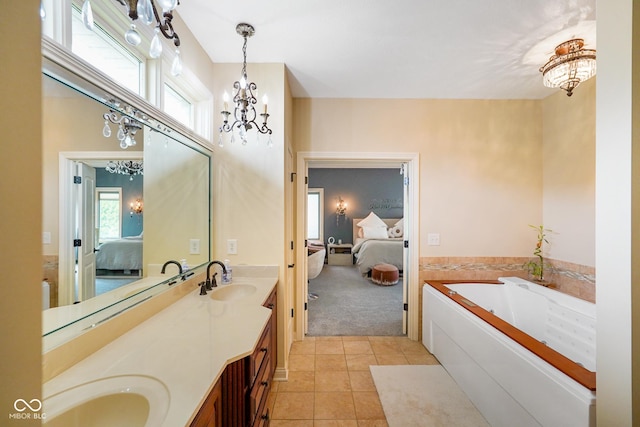 286 S Woodridge Dr, Pittsboro, IN 46167 - full bathroom featuring connected bathroom, a chandelier, double vanity, tile patterned floors, and a garden tub