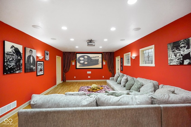286 S Woodridge Dr, Pittsboro, IN 46167 - cinema with an accent wall, recessed lighting, light wood-style floors, and baseboards