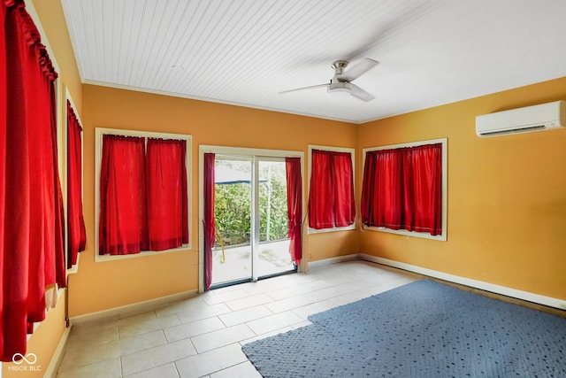 286 S Woodridge Dr, Pittsboro, IN 46167 - empty room with a wall mounted air conditioner, a ceiling fan, baseboards, and tile patterned floors