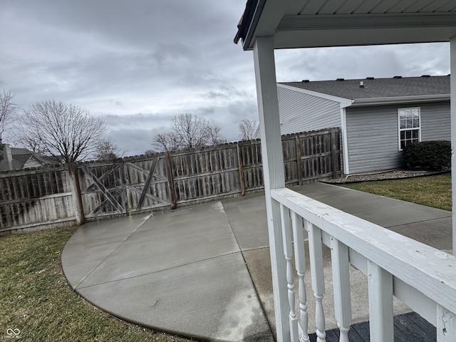 view of patio / terrace featuring fence