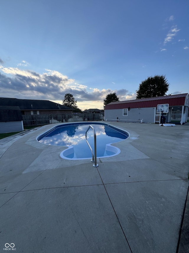 view of pool with fence and a fenced in pool