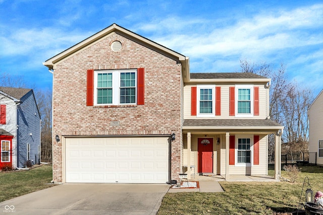 traditional-style home featuring a garage, driveway, a front lawn, and brick siding