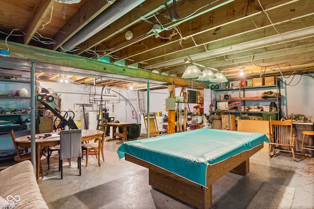 recreation room with pool table, unfinished concrete floors, and electric water heater