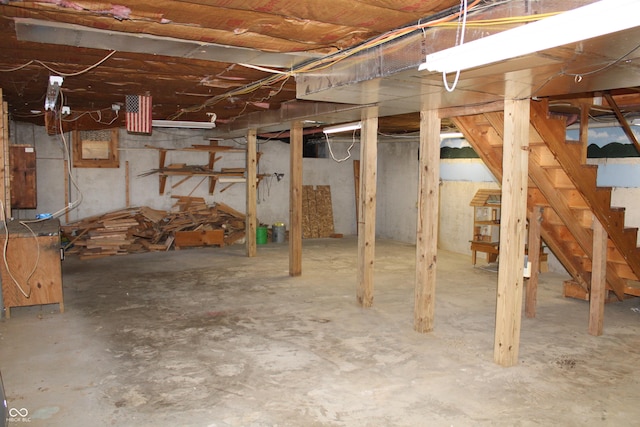 unfinished basement with stairs