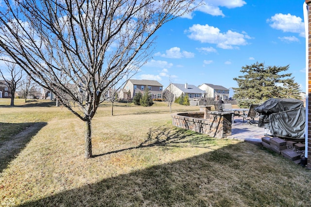 view of yard featuring a residential view