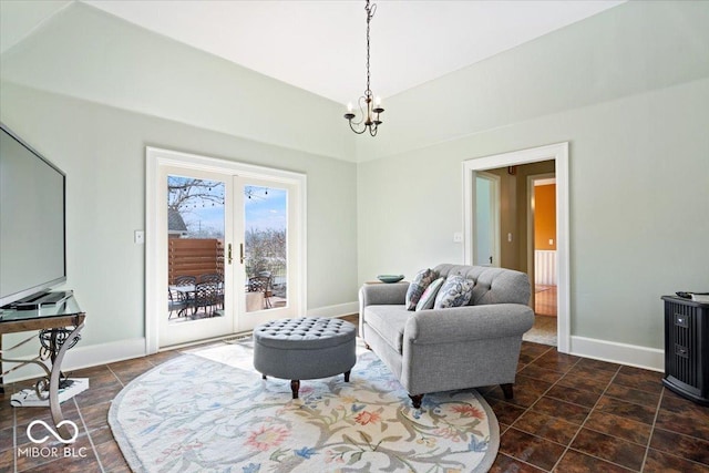 living area with french doors and baseboards