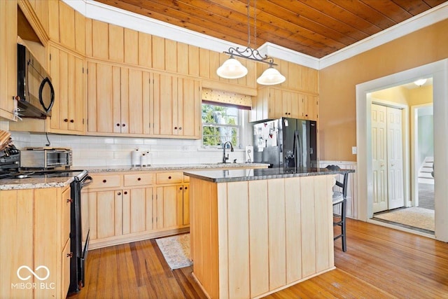 kitchen featuring wood ceiling, a kitchen island, black appliances, and light brown cabinets