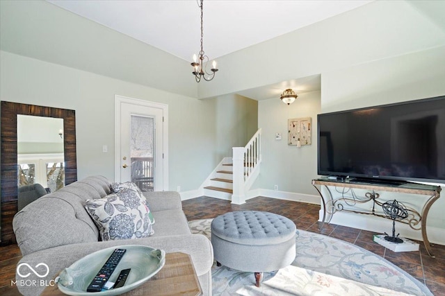 living area featuring stairs and baseboards