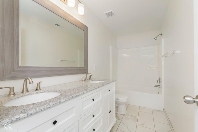 bathroom with marble finish floor, visible vents, a sink, and toilet