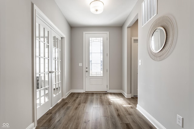 804 Whispering Oaks Dr, Carmel, IN 46032 - entrance foyer with wood finished floors and baseboards