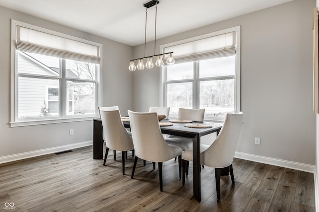804 Whispering Oaks Dr, Carmel, IN 46032 - dining area with wood finished floors and baseboards