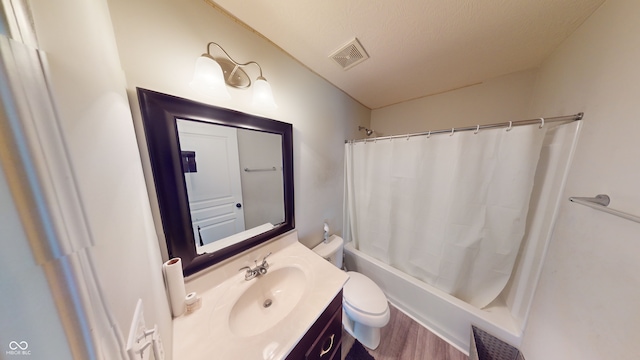 full bath featuring toilet, wood finished floors, vanity, visible vents, and shower / bath combination with curtain