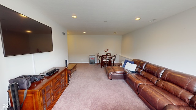 living area with baseboards, carpet floors, visible vents, and recessed lighting