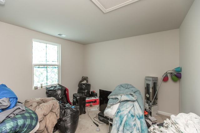 bedroom with carpet floors and baseboards