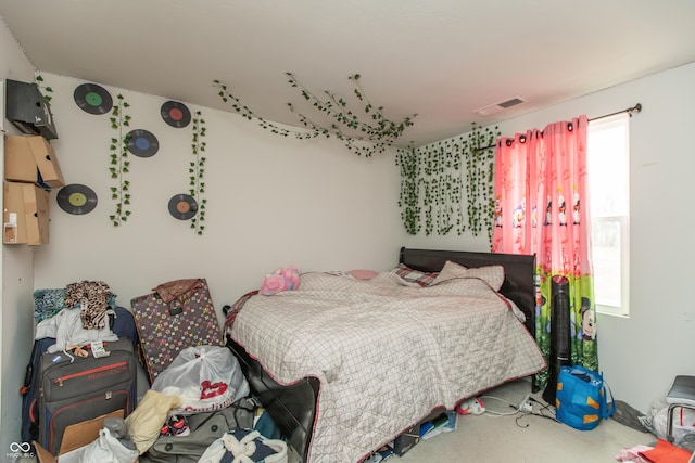 bedroom with visible vents