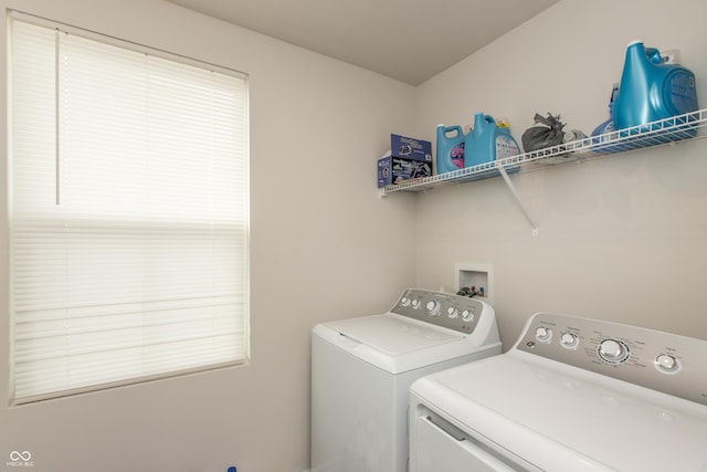 washroom with laundry area and separate washer and dryer