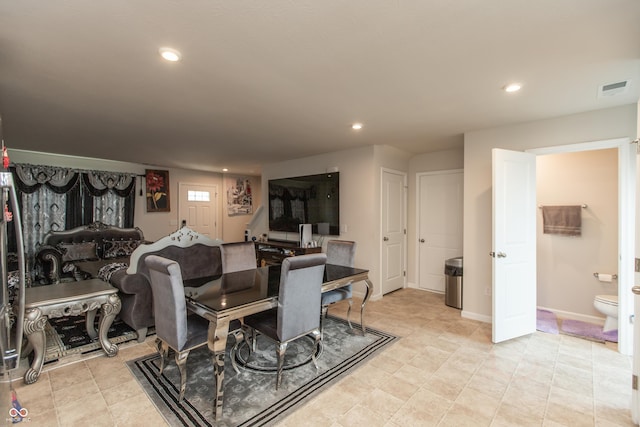 dining room featuring baseboards, visible vents, and recessed lighting