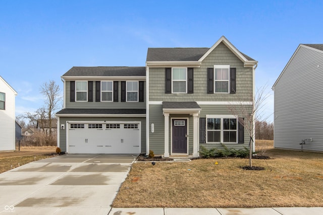 view of front of home with a garage and concrete driveway