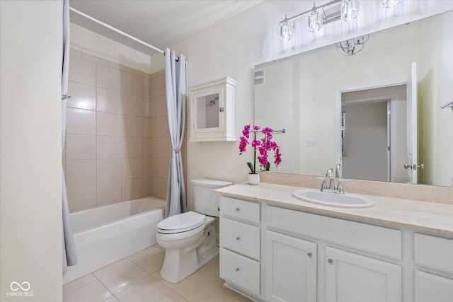 bathroom featuring tile patterned flooring, shower / bathtub combination with curtain, vanity, and toilet