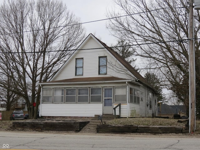 bungalow-style home featuring entry steps