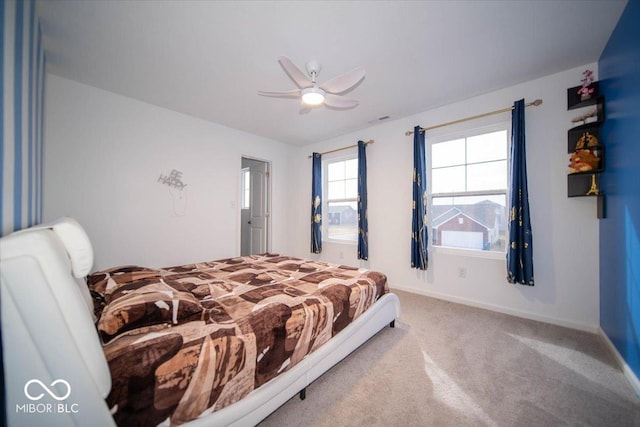10202 Meadow Path Ln, Indianapolis, IN 46239 - bedroom featuring carpet floors, baseboards, and ceiling fan