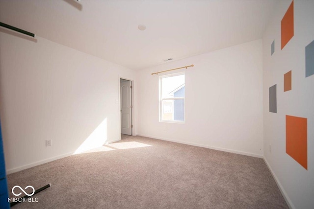 10202 Meadow Path Ln, Indianapolis, IN 46239 - spare room featuring carpet and baseboards