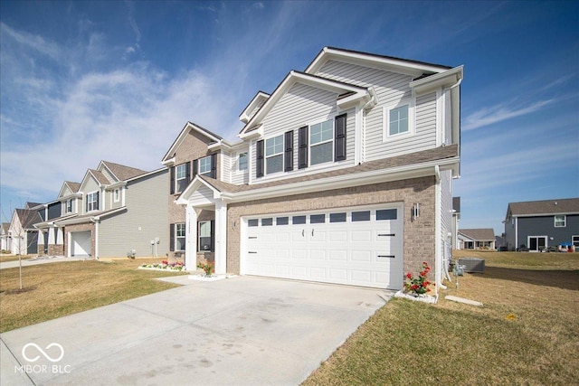 craftsman-style home featuring concrete driveway, an attached garage, a residential view, and a front lawn