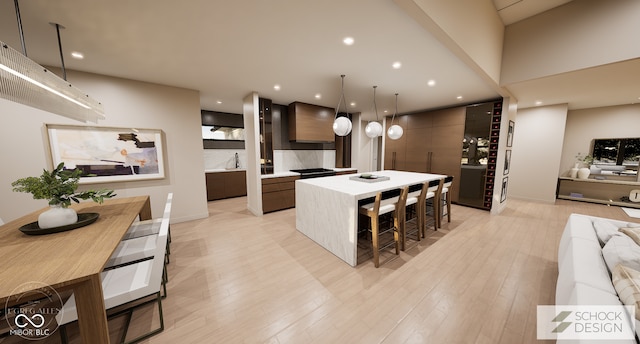 4094 Chapel Hill Ct, Bargersville, IN 46106 - kitchen featuring modern cabinets, light wood-type flooring, wall chimney range hood, a center island, and light countertops