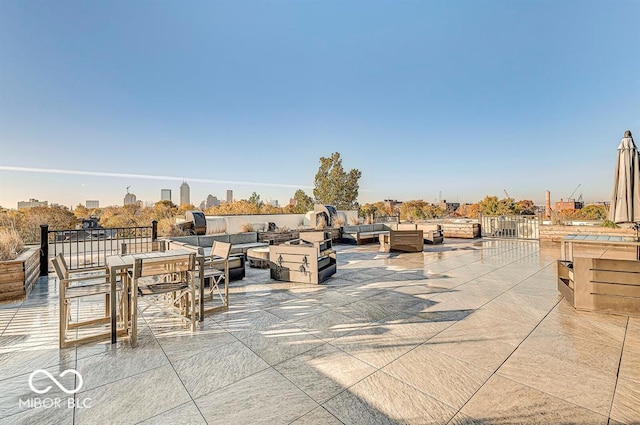 view of patio featuring outdoor dining area and an outdoor hangout area