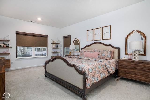 carpeted bedroom featuring recessed lighting, visible vents, and baseboards