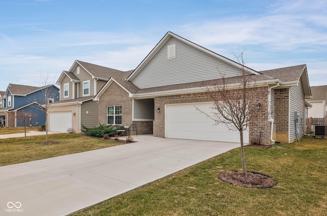 view of front of house featuring cooling unit, a garage, brick siding, driveway, and a front yard