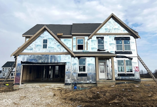 unfinished property with a garage