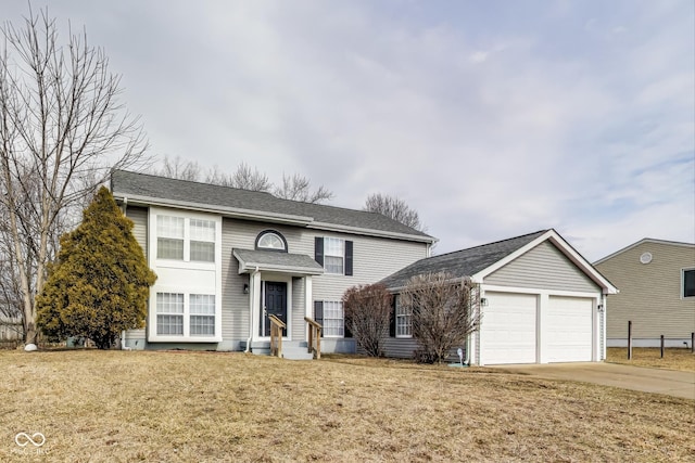 view of front of property with an attached garage, concrete driveway, and a front yard